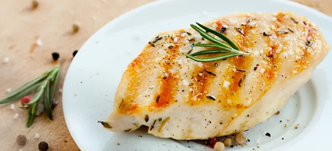 Grilled chicken breast finished with rosemary